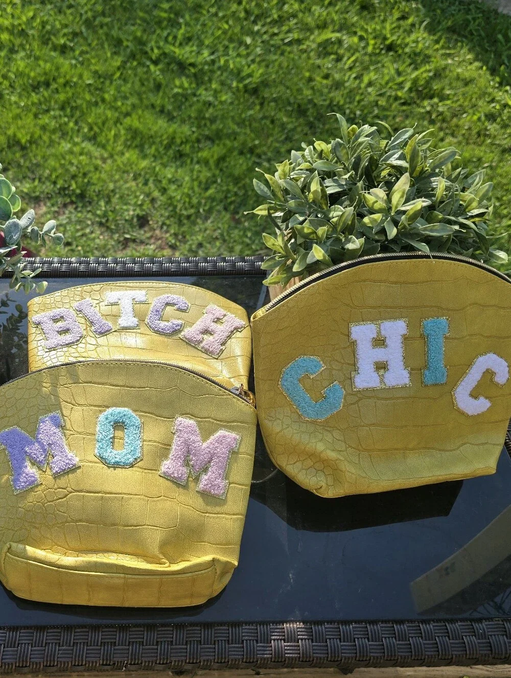 Elizabeth Arden Yellow 'KIND' & 'MESS' Embroidered Cosmetic Pouch